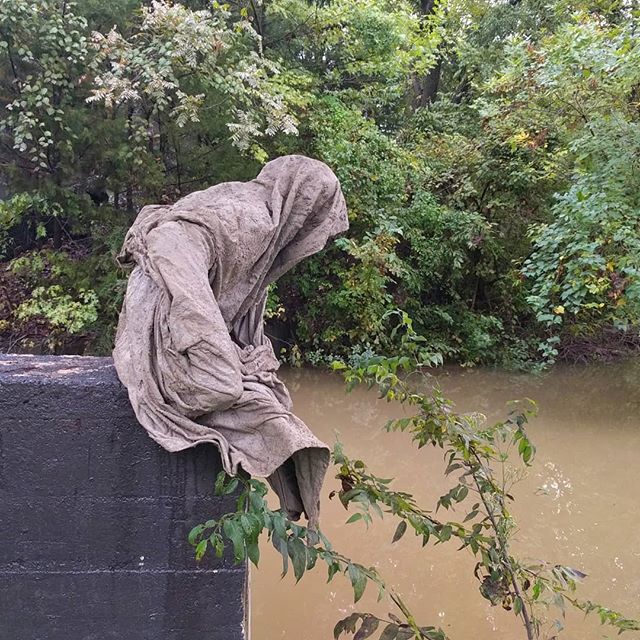 Just a little creepy the way somebody arranged this old drop cloth.